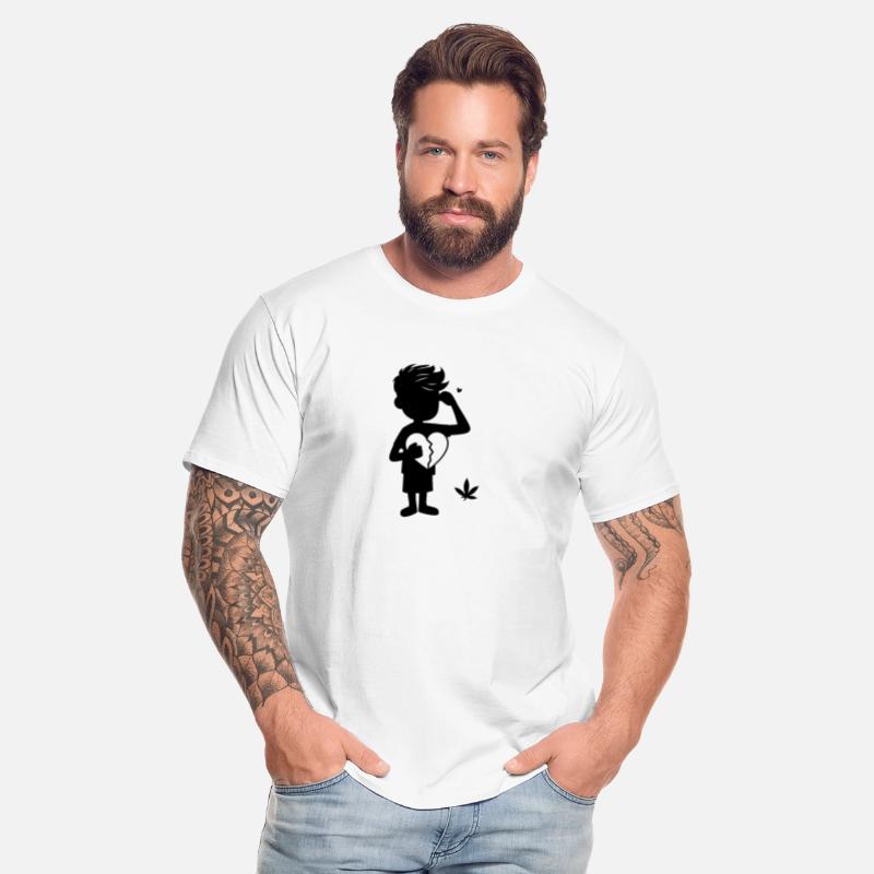 A silhouette of a boy holding a broken heart