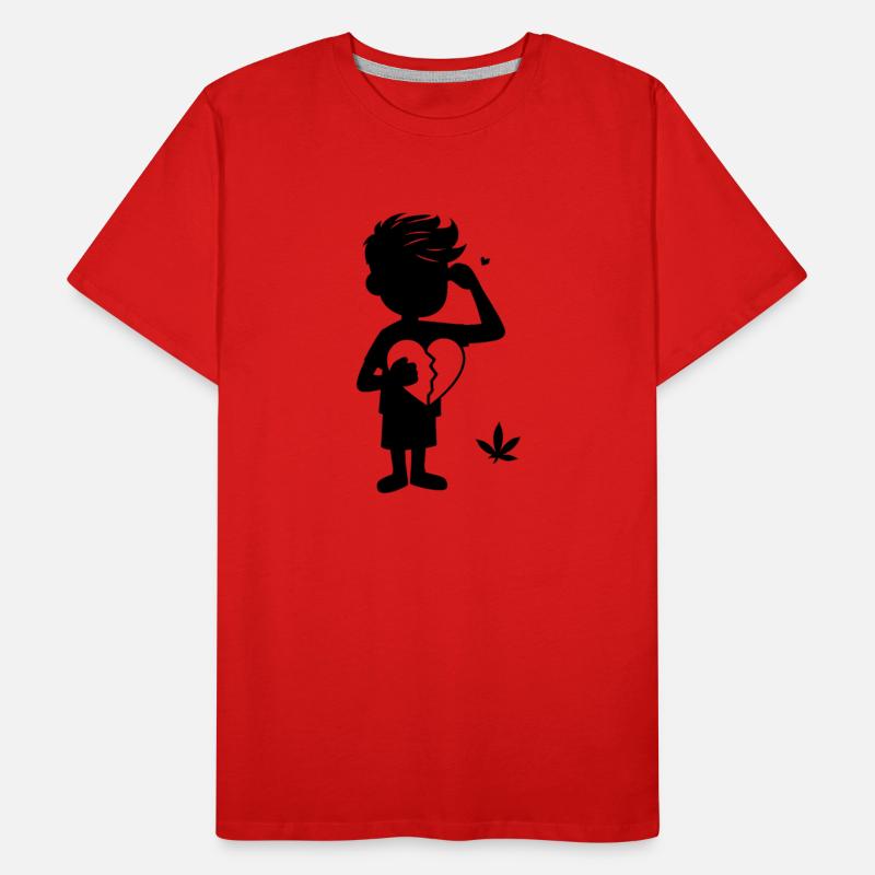 A silhouette of a boy holding a broken heart