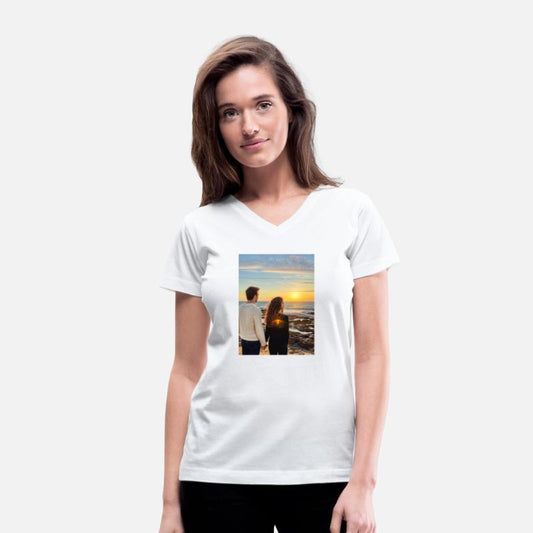 Couple Hand In Hand On Sandy Beach At Sunset